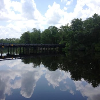 The Outpost - the reflection of a bridge in the water - Dive Bars Near Me - Freeport, Florida The Outpost - the reflection of a bridge in the water - Dive Bars Near Me - Freeport, Florida