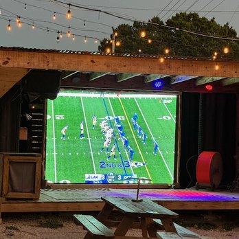 Nameless Saloon - Large outdoor tv to catch all the sports - Food Trucks Near Me - Leander, Texas