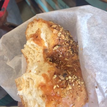 Global Gallery - Donut with pumpkin seeds crushed on top - Coffee & Tea Near Me - Columbus, Ohio Global Gallery - Donut with pumpkin seeds crushed on top - Coffee & Tea Near Me - Columbus, Ohio