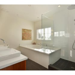 Coordinated Kitchen and Bath - New Bathroom with cabinets