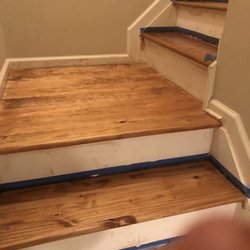 Straight Edge Painting & Finishing - Progress Picture - Sanding and re-staining interior stairs.