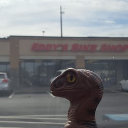 Eddy's Bike Shop - Bob the Raptor Says "Mammals come here for motorcycles without engines."