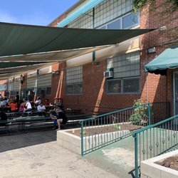 St Anthony Elementary School - Seating area for each group. The kids meet here in the morning for assembly and also have lunch with their grade.