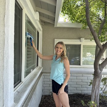Squeaky Clean Services - Owner-Lily washing windows - Window Washing Near Me Squeaky Clean Services - Owner-Lily washing windows - Window Washing Near Me