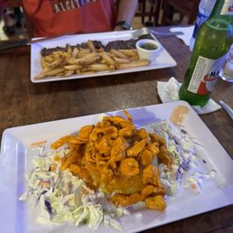 Skirt Steak with side (fries) and the chicken mofongo.