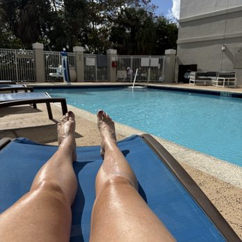 SpringHill Suites by Marriott Miami Doral - 4 longe chairs by the pool, that's it. - Hotels Near Me - Miami, Florida