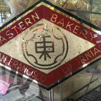 Eastern Bakery - The original logo emblem on the window of the historic Eastern Bakery - Bakeries Near Me - San Francisco, California