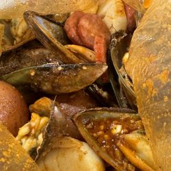 Boiling Catch - Scallops, green mussels, potatoes and sausage.