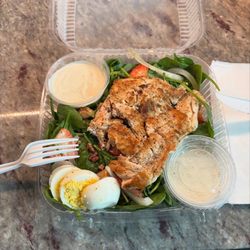 Everybody Loves Brunch - Spinach salad with strawberries, red onions, pecans, hardboiled egg and grilled chicken.