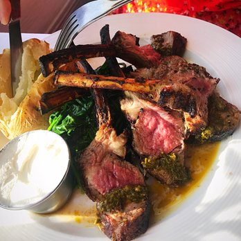 Harbor Mist - Rack of lamb medium rare with sautéed spinach and baked potato - Seafood Near Me - Cold Spring Harbor, New York
