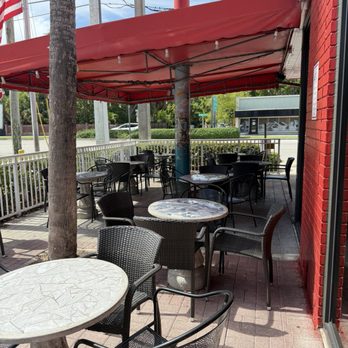 Dandee Donut Factory - Outside seating - Donuts Near Me - Pompano Beach, Florida Dandee Donut Factory - Outside seating - Donuts Near Me - Pompano Beach, Florida