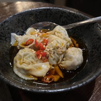 Mott 32 - Dumplings with chilli oil - Chinese Near Me - Vancouver, British Columbia Mott 32 - Dumplings with chilli oil - Chinese Near Me - Vancouver, British Columbia