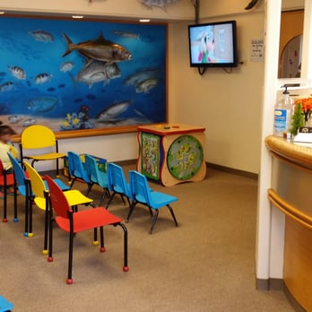 Aiea Pediatric Dental Center - Big waiting room w/television, activity table and magazine rack. - Pediatric Dentists Near Me - Aiea, Hawaii Aiea Pediatric Dental Center - Big waiting room w/television, activity table and magazine rack. - Pediatric Dentists Near Me - Aiea, Hawaii