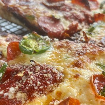 COMO's Restaurant - Joshua J (Large) - Pizza Near Me - Ferndale, Michigan