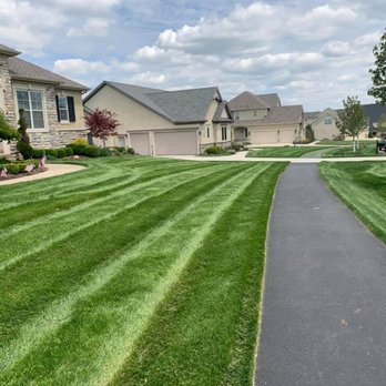 Green Line Landscape - a residential neighborhood with a paved driveway - Landscaping Near Me Green Line Landscape - a residential neighborhood with a paved driveway - Landscaping Near Me