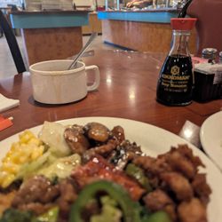 Taste of China - Creme corn, peppered fried chicken w/ jalapenos. Mushroom chicken. Charsiu Pork Ribs, sauteed cabbage. And broccoli combination. Not bad