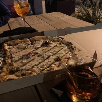 Devoured Pop-Up - a box of pizza and a drink - Pizza Near Me - Kansas City, Missouri