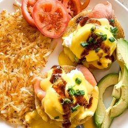 Eggsquisite Cafe - Rockwall - Now Open for Breakfast - Salmon Benedict with cream cheese, hollandaise and our homemade hot sauce!  Served with hash browns and fruit.