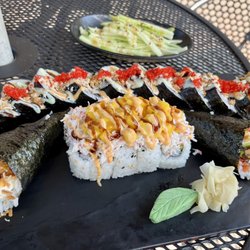 Green's Grill & Sushi Bar - Cucumber salad, origi's roll, mr. Dilla roll, hand rolls.