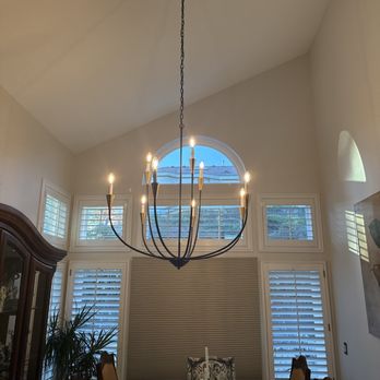 Johnny Electric - Dining chandelier with lights on - Electricians Near Me - Irvine, California