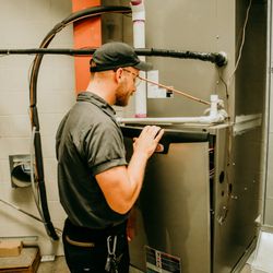 Comfort Solutions - Servicing a high efficiency Lennox furnace.
