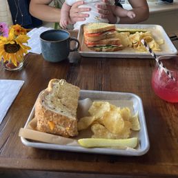 Grilled cheese, Pesto Grilly, Hibiscus Passion Lemonade, Black Coffee, chips and a pickle spear