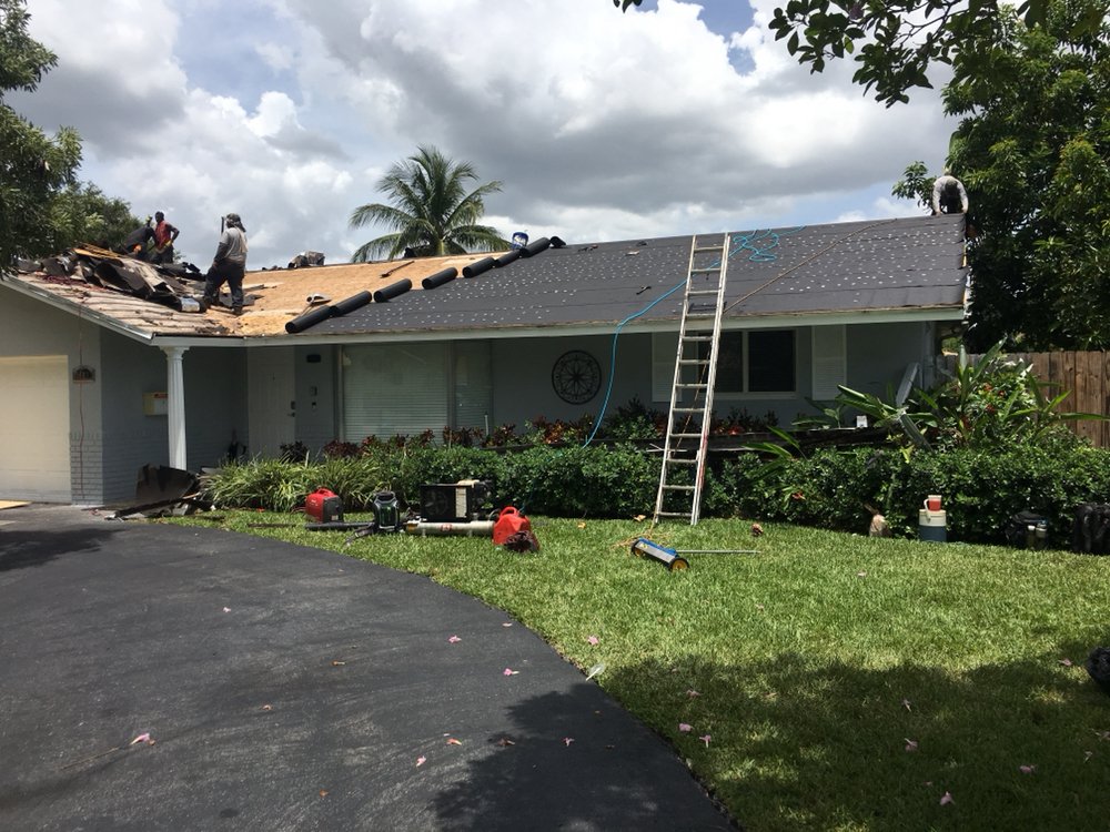 Slide of Rocky's Roofing