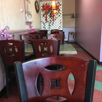 Best Taste - a dining room with a table and chairs - Chinese Near Me - North Providence, Rhode Island Best Taste - a dining room with a table and chairs - Chinese Near Me - North Providence, Rhode Island