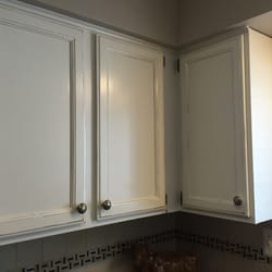 Nelson's Painting - Cabinets formerly golden oak stain and now a lightly distressed White Dove!