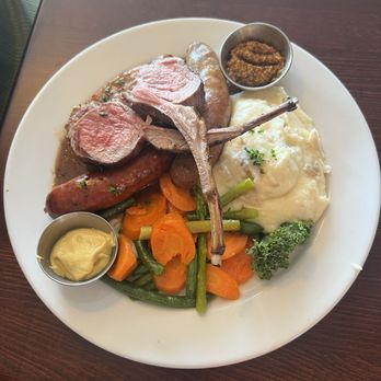 Black Forest Restaurant - Mixed grill sampler with sausage, lamb and veal. Lamb was amazing! - German Near Me - Naples, Florida