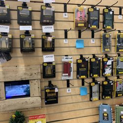 99 Repairs - We may be a little inventive.. We've repurposed some old iPads & pallet wood for our Otterbox Display. Squamish's Most Trusted Repair Center