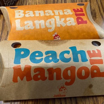 Jollibee - two bags of food on a table - Chicken Shop Near Me - Scarborough, Alberta Jollibee - two bags of food on a table - Chicken Shop Near Me - Scarborough, Alberta