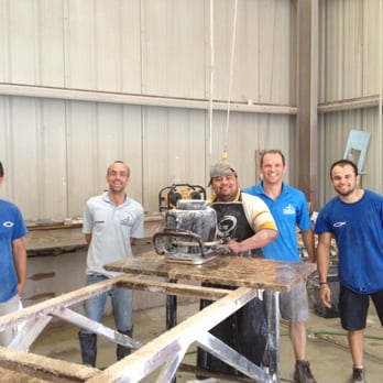 A Plus Marble & Granite Designs - a group of men in a workshop - Countertop Installation Near Me - New Orleans, Louisiana A Plus Marble & Granite Designs - a group of men in a workshop - Countertop Installation Near Me - New Orleans, Louisiana