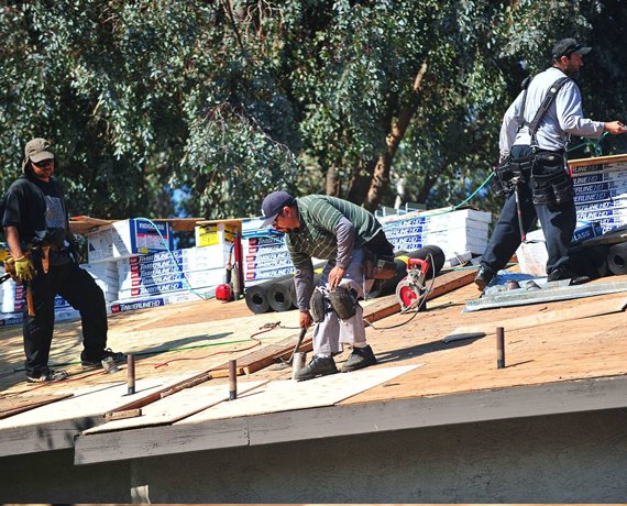 Slide of Western Roofing Group