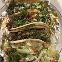 Taqueria Lindo Michoacan - Various tacos. top to bottom: cabeza, pastor, asada, and fish