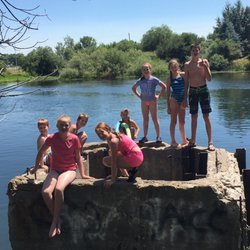 St. Anthony's Sandbar - An old well (maybe) back behind the bushes near the diving board. Fun to jump off of and float to the beach.