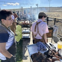 Getting ready to divide the pig for serving.