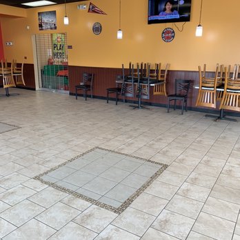 A Town Wings - an empty restaurant with chairs and tables - Chicken Wings Near Me - Augusta, Georgia A Town Wings - an empty restaurant with chairs and tables - Chicken Wings Near Me - Augusta, Georgia