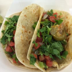 La Azteca Meat Market - One beef and one chicken taco on flour tortilla! Yummy tex mex!