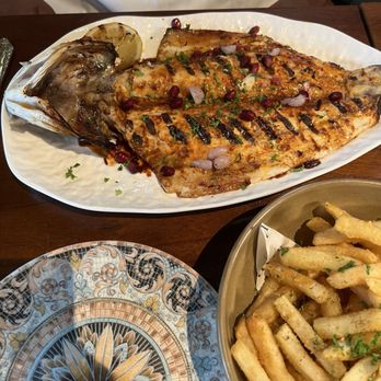 aya - Branzino with Truffle Fries - Middle Eastern Near Me - Milwaukee, Wisconsin aya - Branzino with Truffle Fries - Middle Eastern Near Me - Milwaukee, Wisconsin