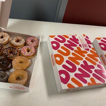 Dunkin' - two boxes of doughnuts on a table - Donuts Near Me - Lake Orion, Michigan Dunkin' - two boxes of doughnuts on a table - Donuts Near Me - Lake Orion, Michigan
