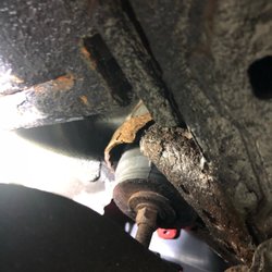 CarLax - Rusted out rear body mount.