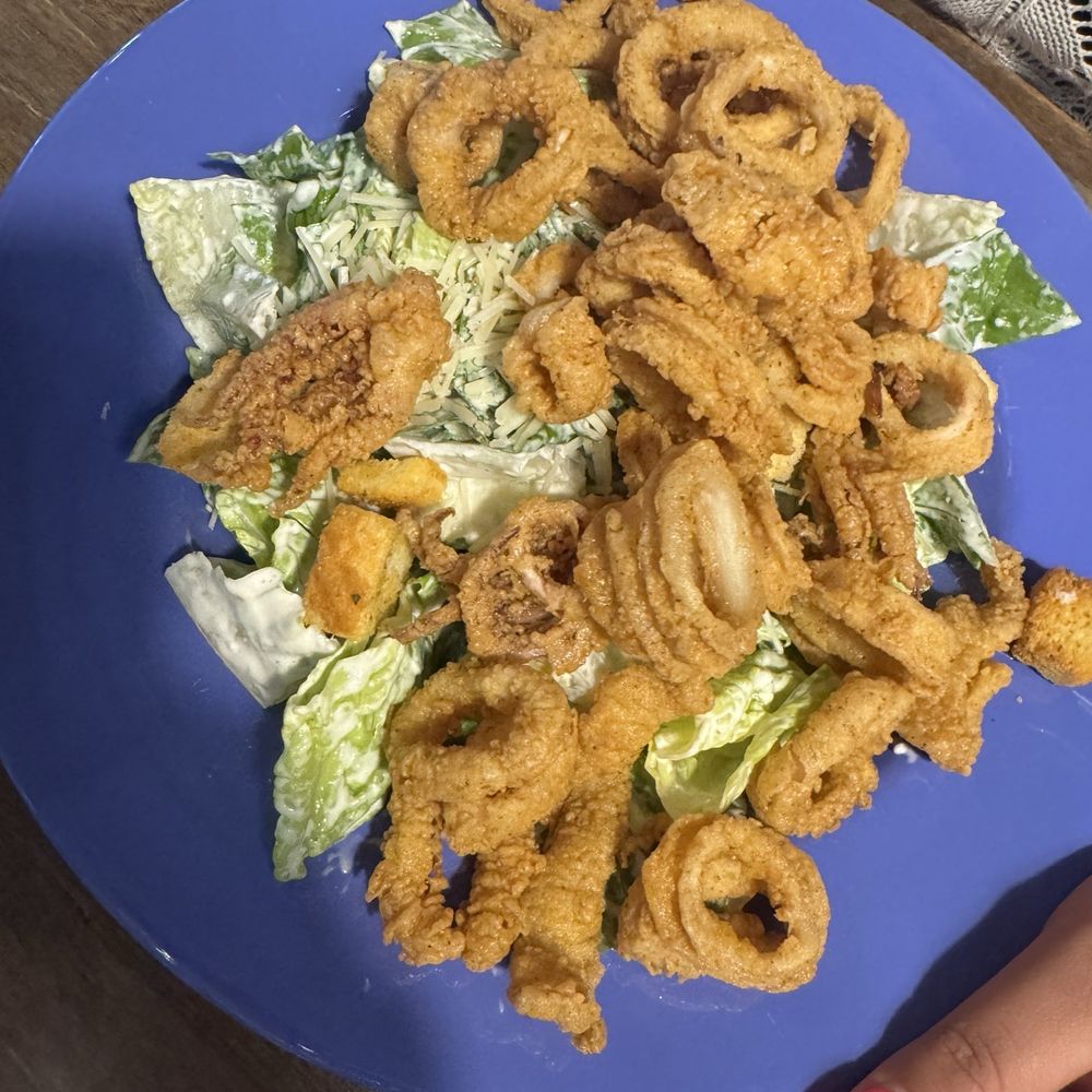 Frenchy's Saltwater Cafe - Caesar salad with calamari - Seafood Near Me - Clearwater Beach, Florida Frenchy's Saltwater Cafe - Caesar salad with calamari - Seafood Near Me - Clearwater Beach, Florida