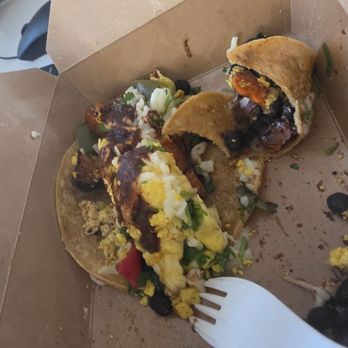 ORGANICO - Breakfast taco : sweet potato, black beans, scrambled eggs, cheese, steamed bell pepper and tofu. (Half eaten). With their salsa. - Cafes Near Me - Los Angeles, California