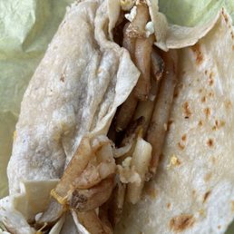 French fries in a breakfast burrito. So oily it's not edible. French fries in a breakfast burrito. So oily it's not edible.