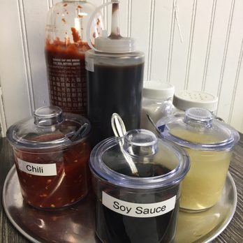 Pho Ga District - Sauces at each table. - Vietnamese Near Me - Rosemead, California Pho Ga District - Sauces at each table. - Vietnamese Near Me - Rosemead, California