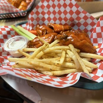 Roman's Oasis - Chicken wings and fries (hot) - Dive Bars Near Me - Goodyear, Arizona
