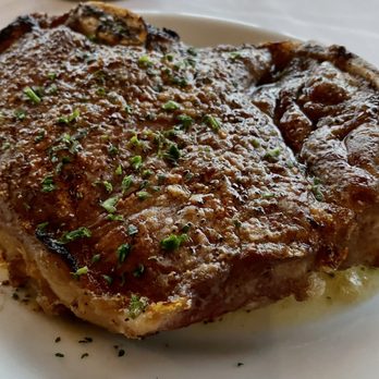 Ruth's Chris Steak House - Bone-In New York Strip - Steakhouses Near Me - Arlington, Virginia Ruth's Chris Steak House - Bone-In New York Strip - Steakhouses Near Me - Arlington, Virginia
