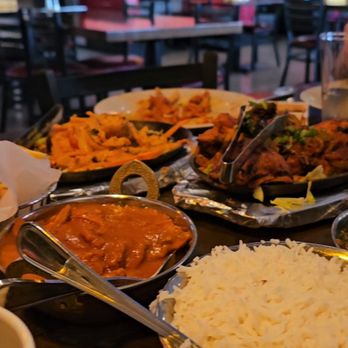 Masala Waves - Butter chicken, Tandoori Fish, Tikki Masala Fries, Tandoori Chicken, Rice - just part of our meal - Indian Near Me - Huntington Beach, California Masala Waves - Butter chicken, Tandoori Fish, Tikki Masala Fries, Tandoori Chicken, Rice - just part of our meal - Indian Near Me - Huntington Beach, California