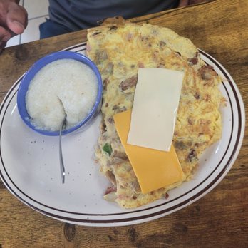 Twisted Biscuit Cafe - Veggie scramble with grits and cheese. - Breakfast & Brunch Near Me - Palm Bay, Florida